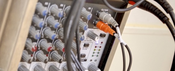 Cables plugged into musical equipment