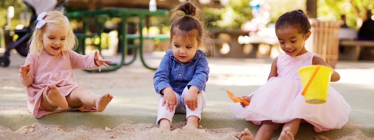 young children playing in sandpit