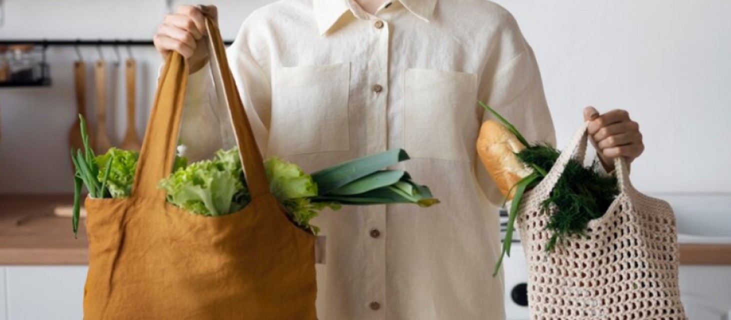 woman carrying bags filled with food